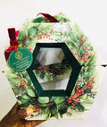 Premium selection tea and infusion collection set packaged in a hexagonal holiday-themed box.