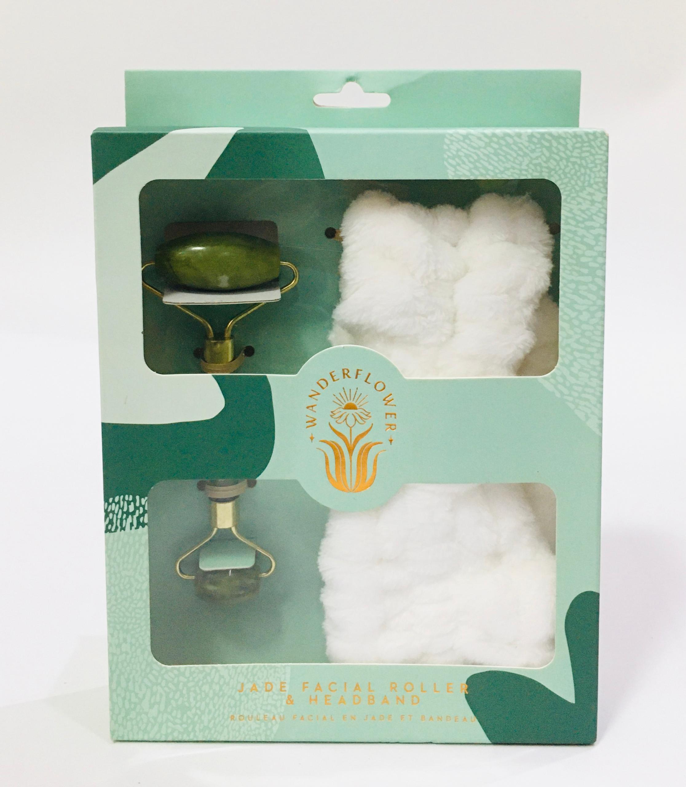 Wanderflower Jade Facial Roller & Headband set includes a dual-ended stone roller and a plush headband for skincare routines.